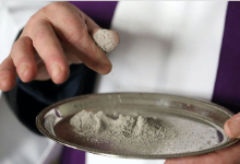 priest holds patten on ashes; image from vaticannews.en