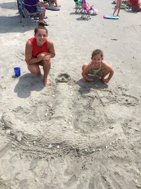 Students make a sand anchor while on summer vacation.