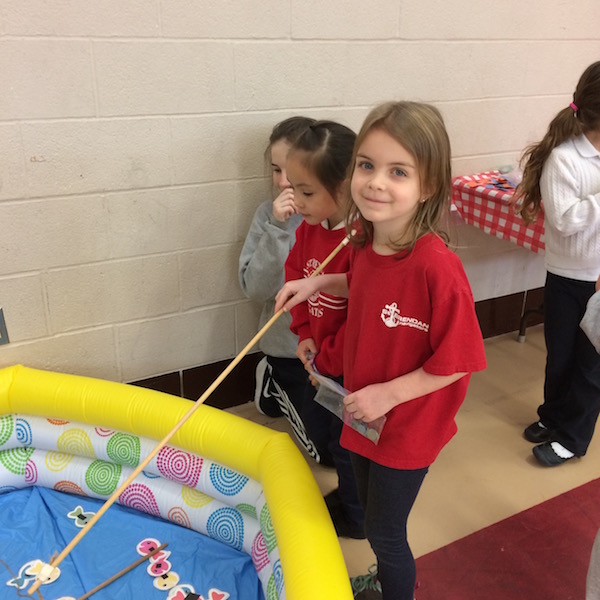 Students enjoy a game at the math carnival