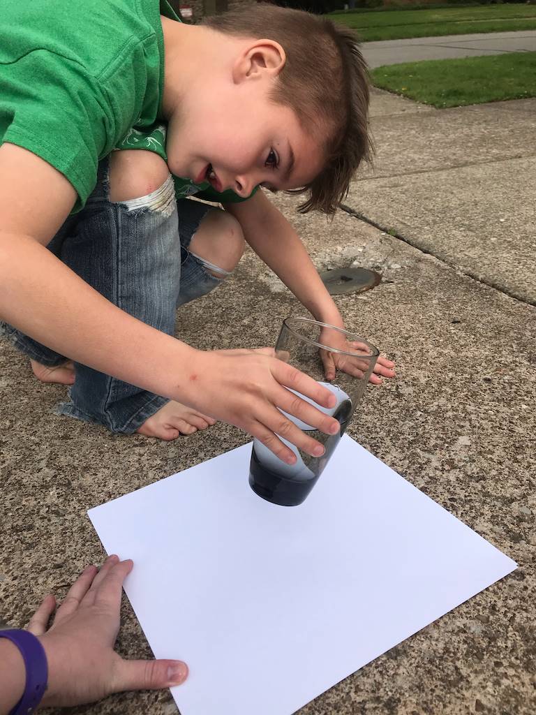 boy making rainbow