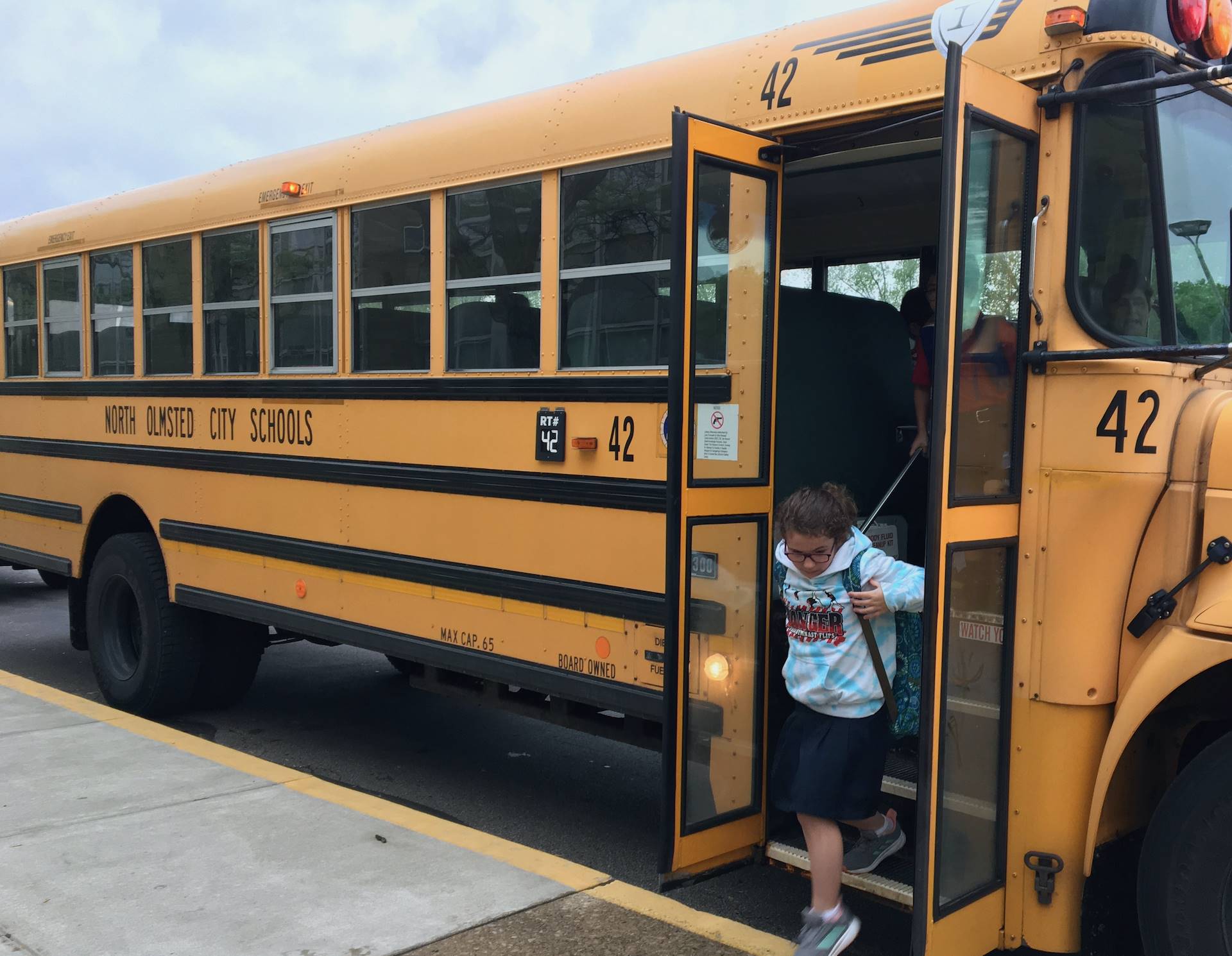student exits school bus
