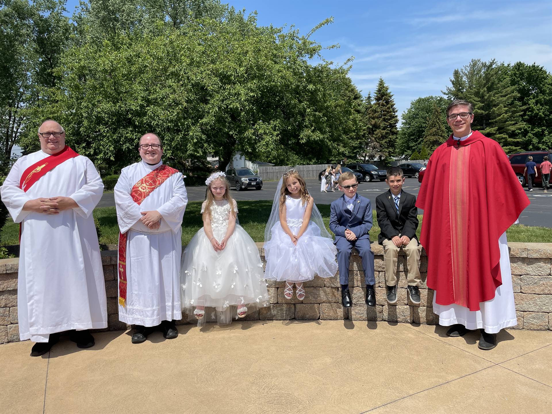 pastor and deacons pose for a photo with the communicants