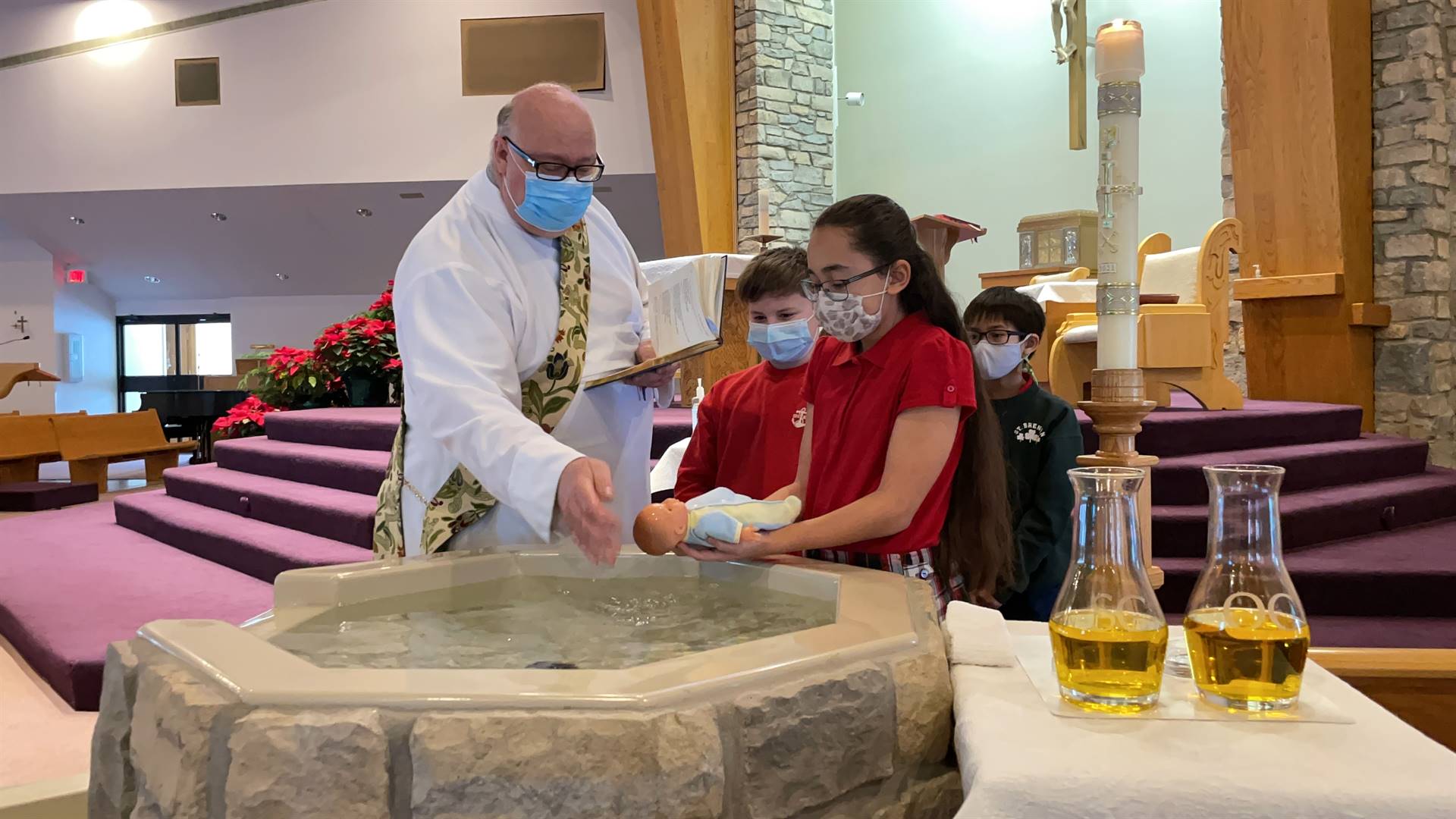 deacon bob educates 5th grade on the baptism process