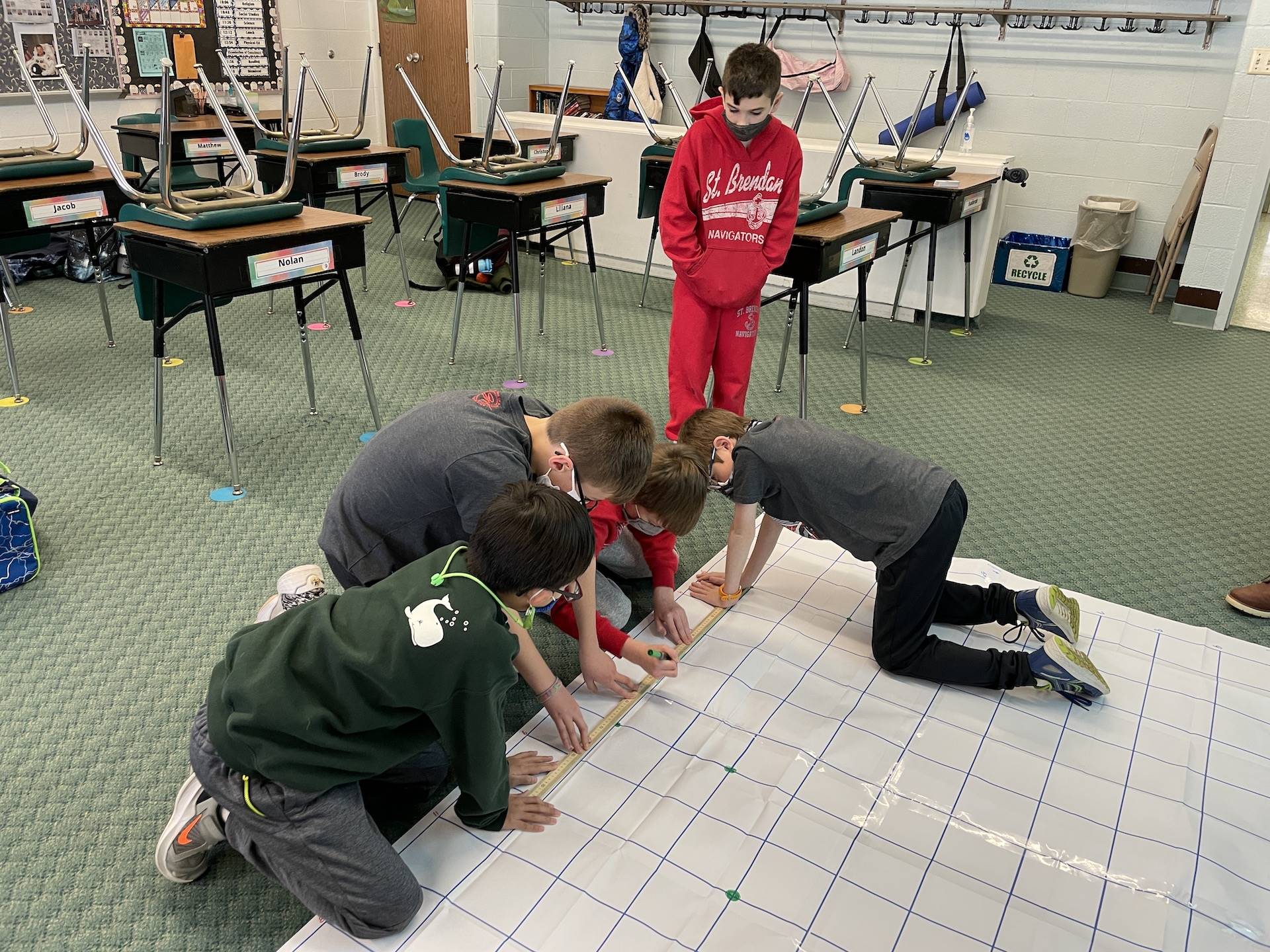 Crazy 8 math club learns to graph