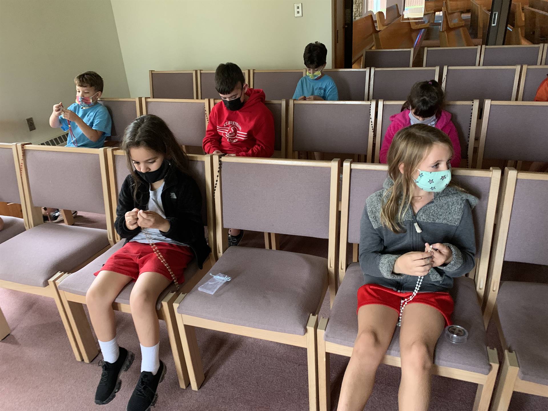 catholic kids club prays the Rosary