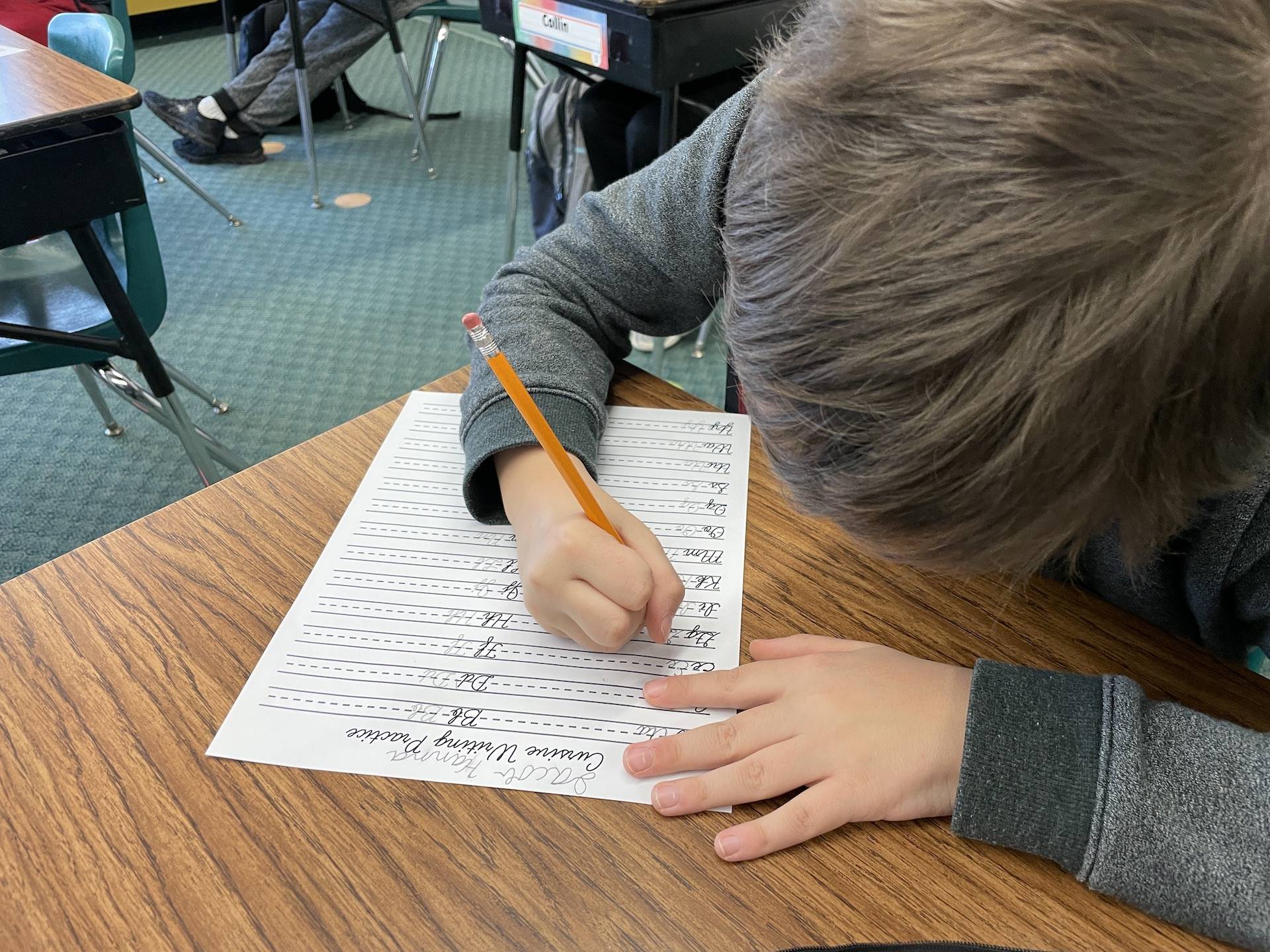 student practices handwriting