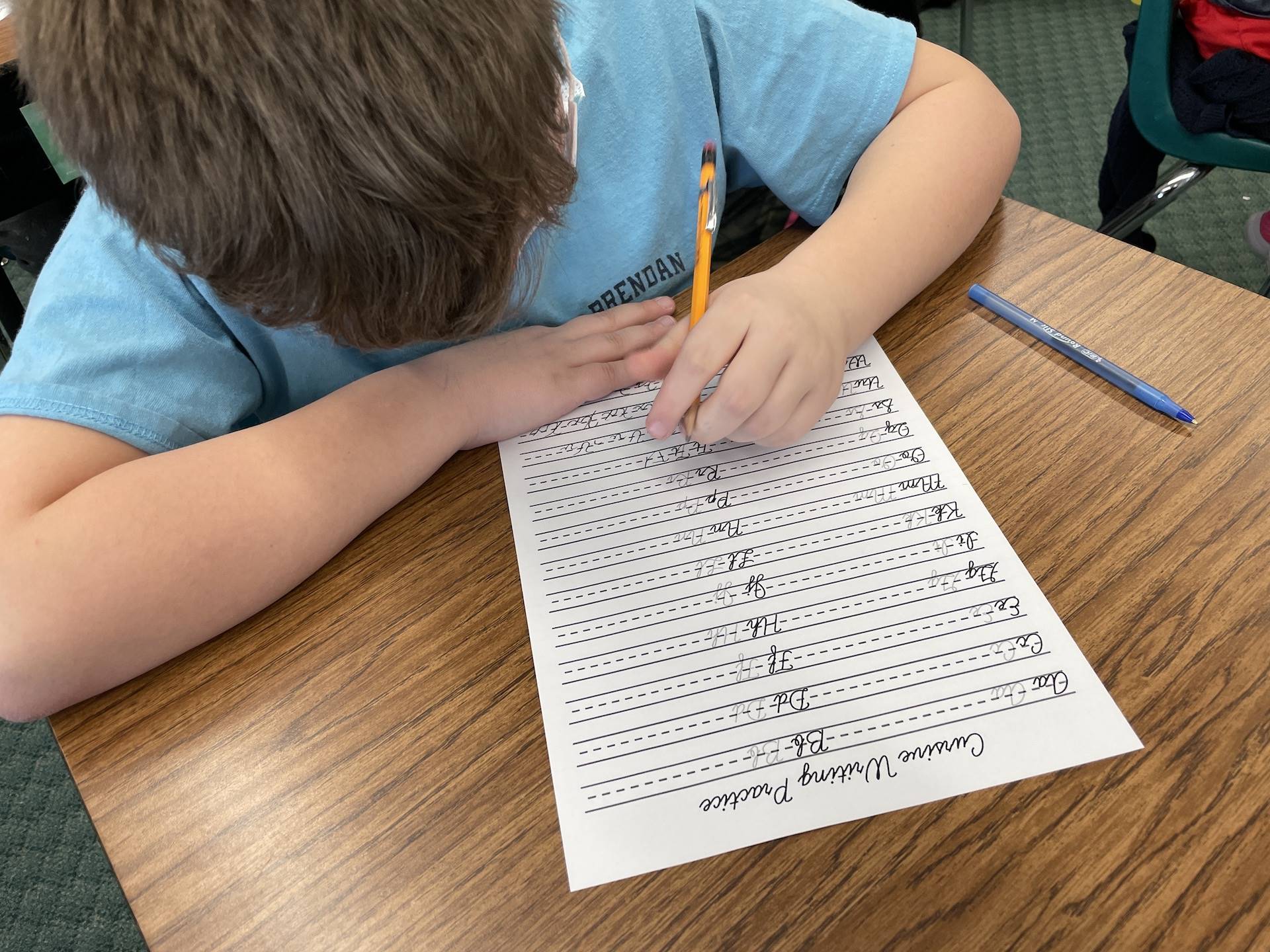 student practices handwriting