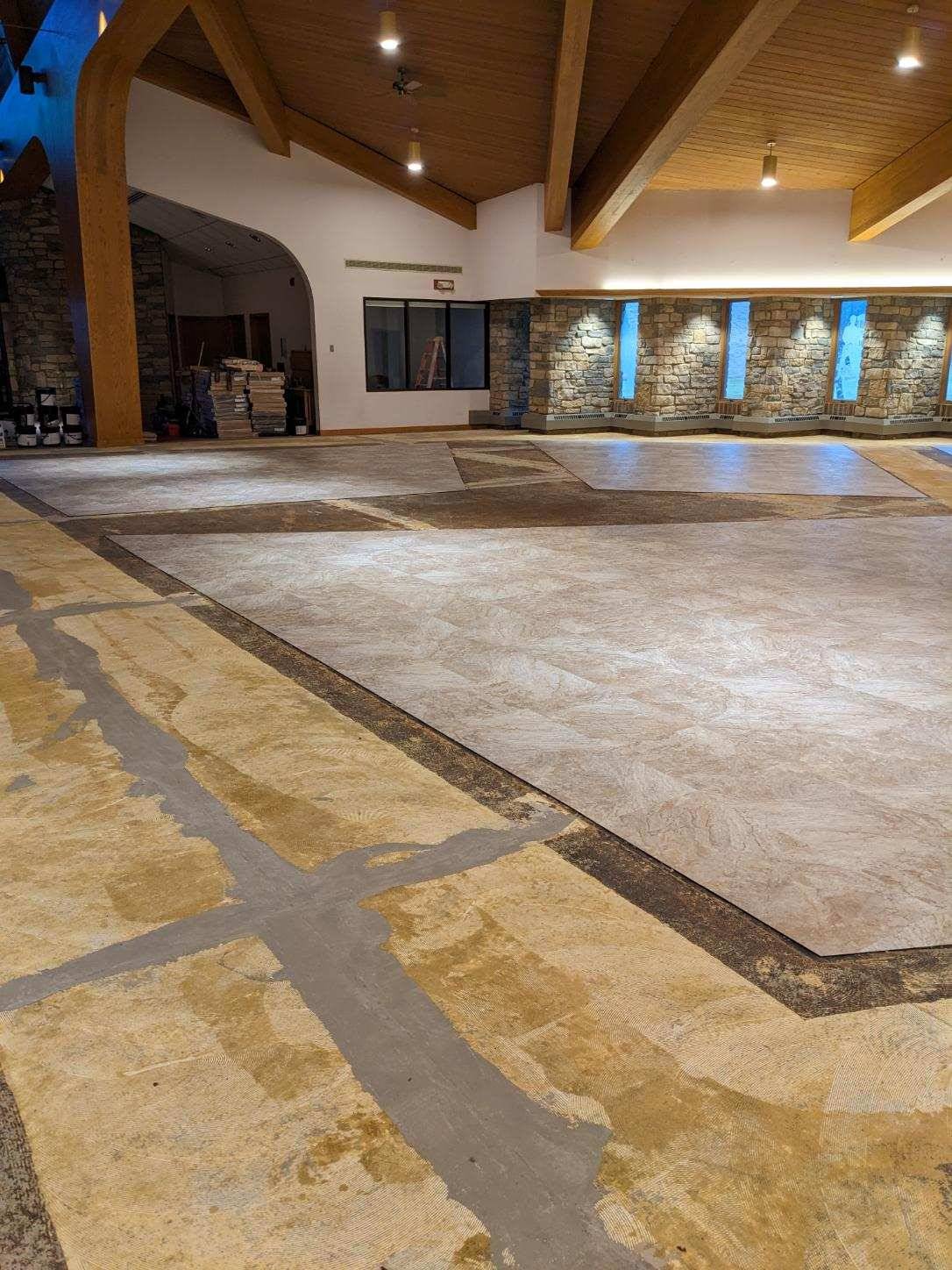 new tile flooring being laid in the body of the church