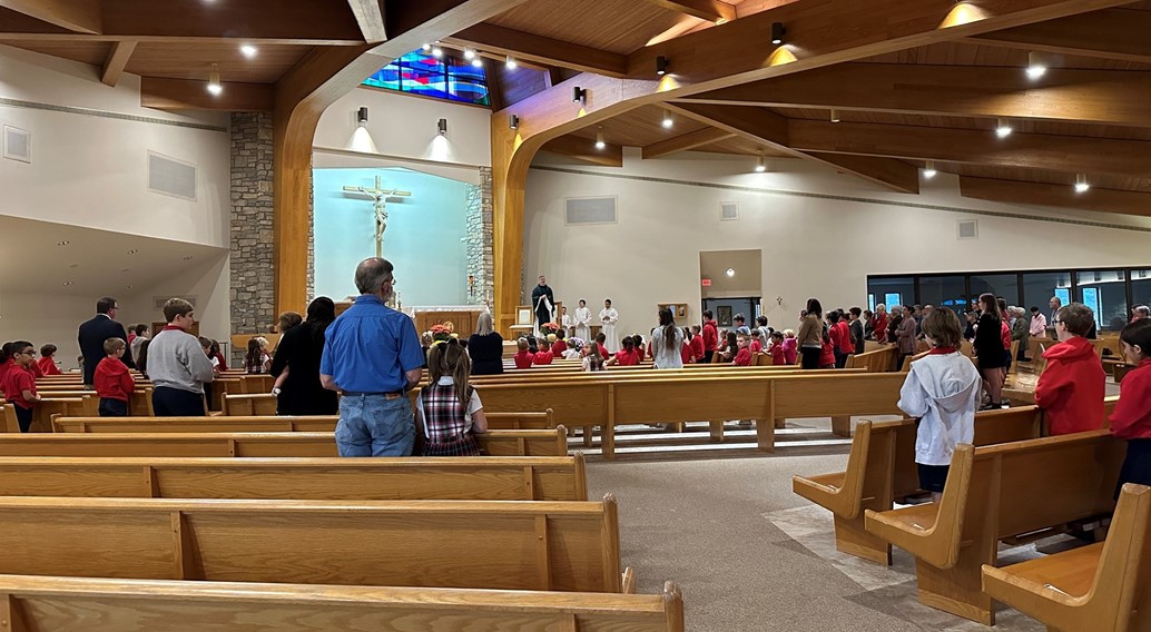 children attend mass