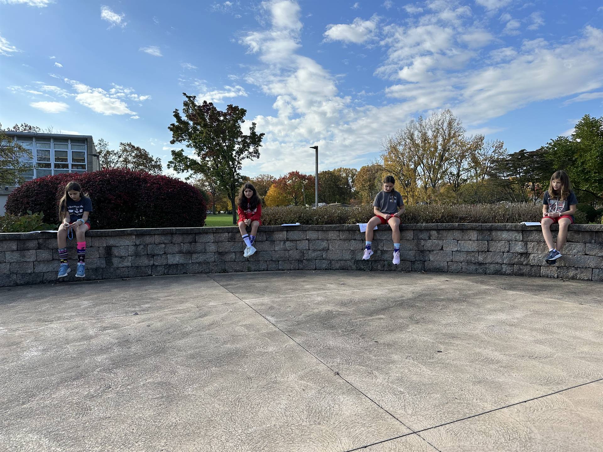 grade 5 prays the rosary in the prayer garden