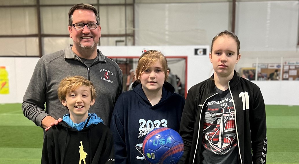 mr wisnor and students volunteer at an adaptive sports program