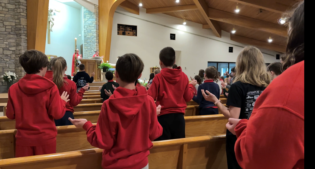 students celebrate eucharist