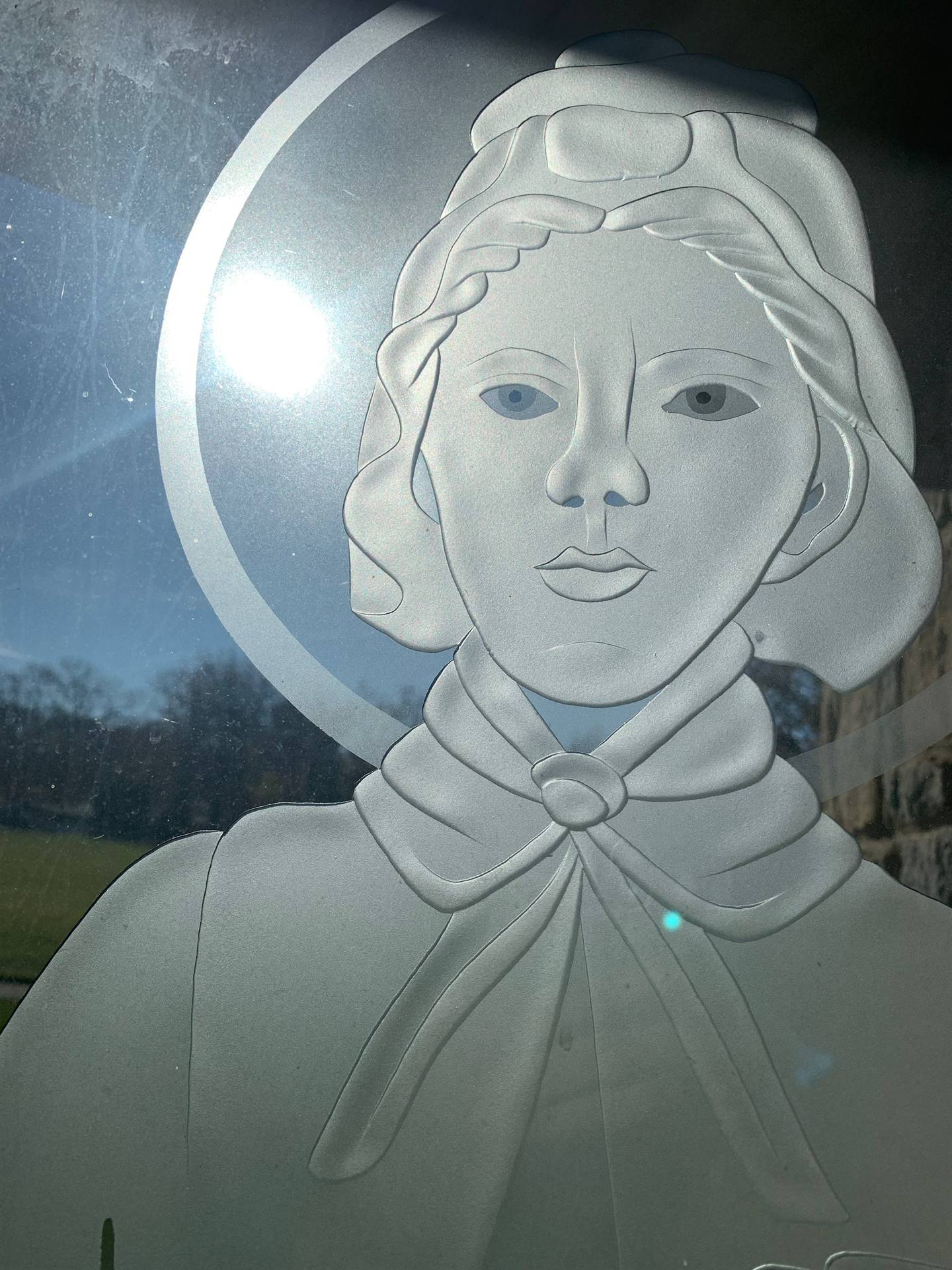 etched windows of saints