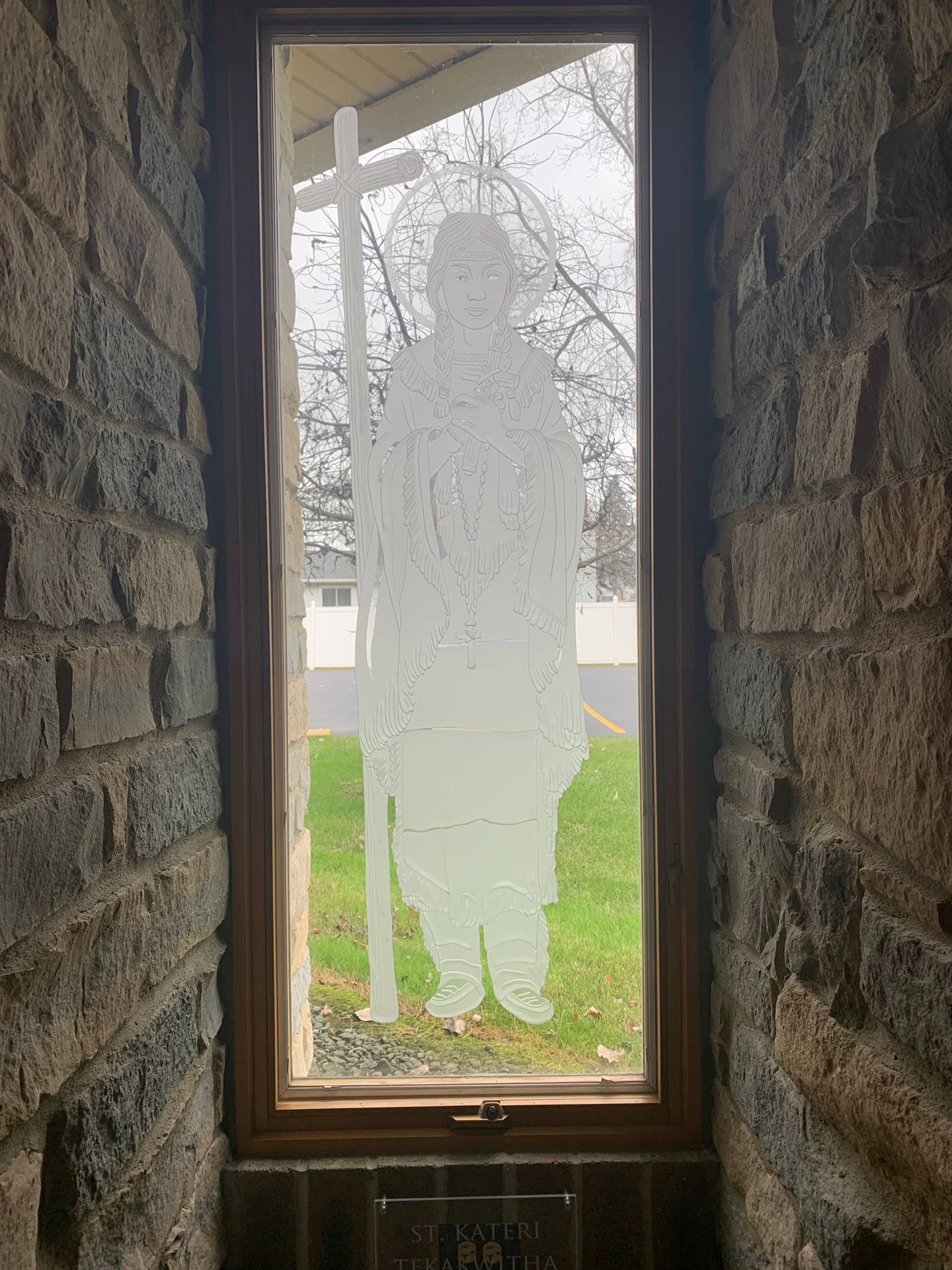 etched windows of saints