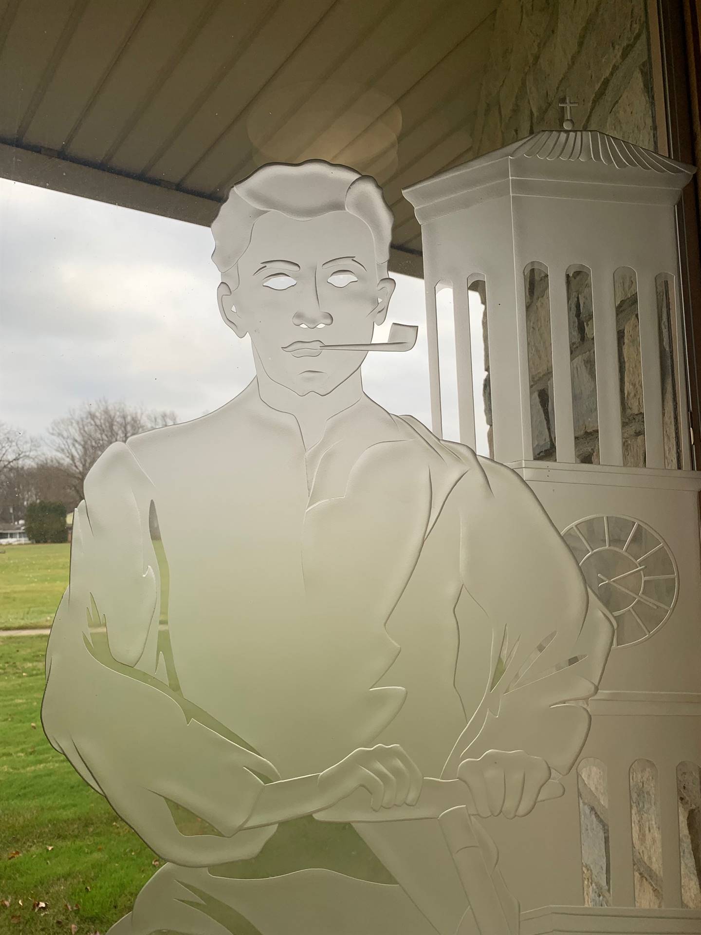 etched windows of saints