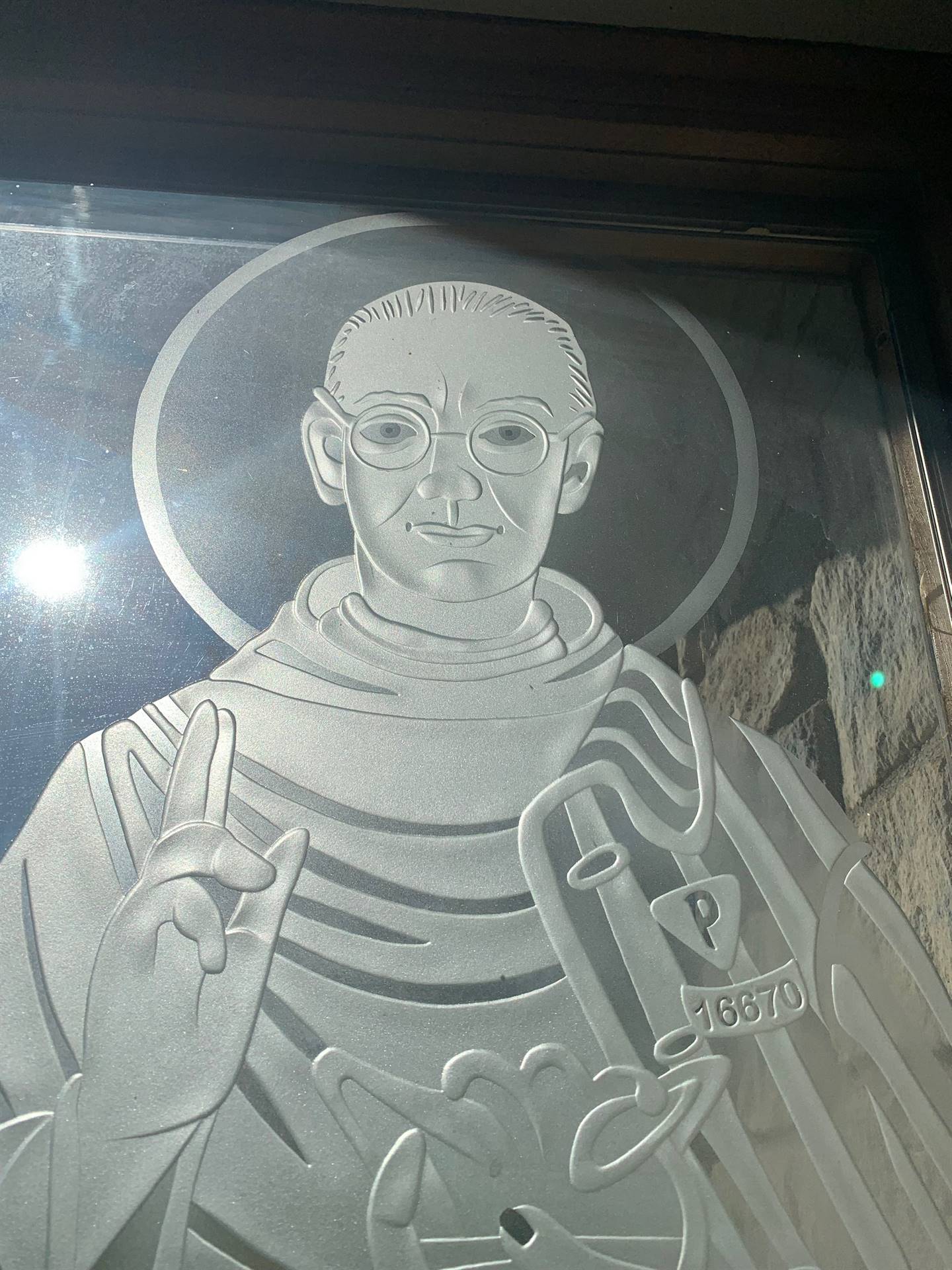 etched windows of saints