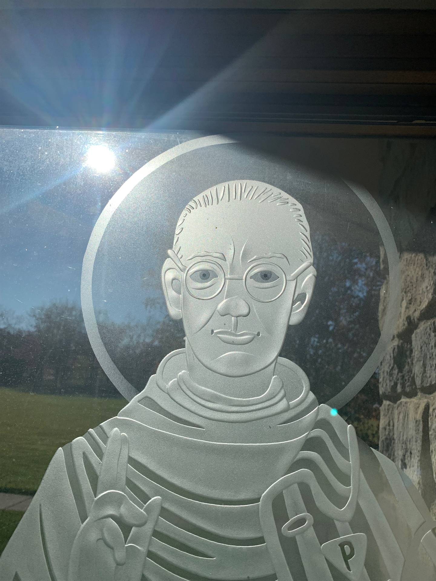 etched windows of saints