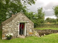 Fr. Tom Woost in Ireland in doorway of St. Brendan's house